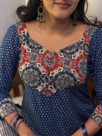 Close-up of hand-block printed yoke on [PBC1001] – red and cream floral-paisley motifs on navy cotton