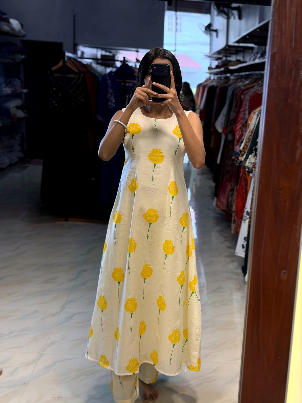 [PBC1002] Ivory Marigold Jaipur Hand-Block Cotton A-Line Kurti – full-length mirror view showing silhouette and matching bottoms
