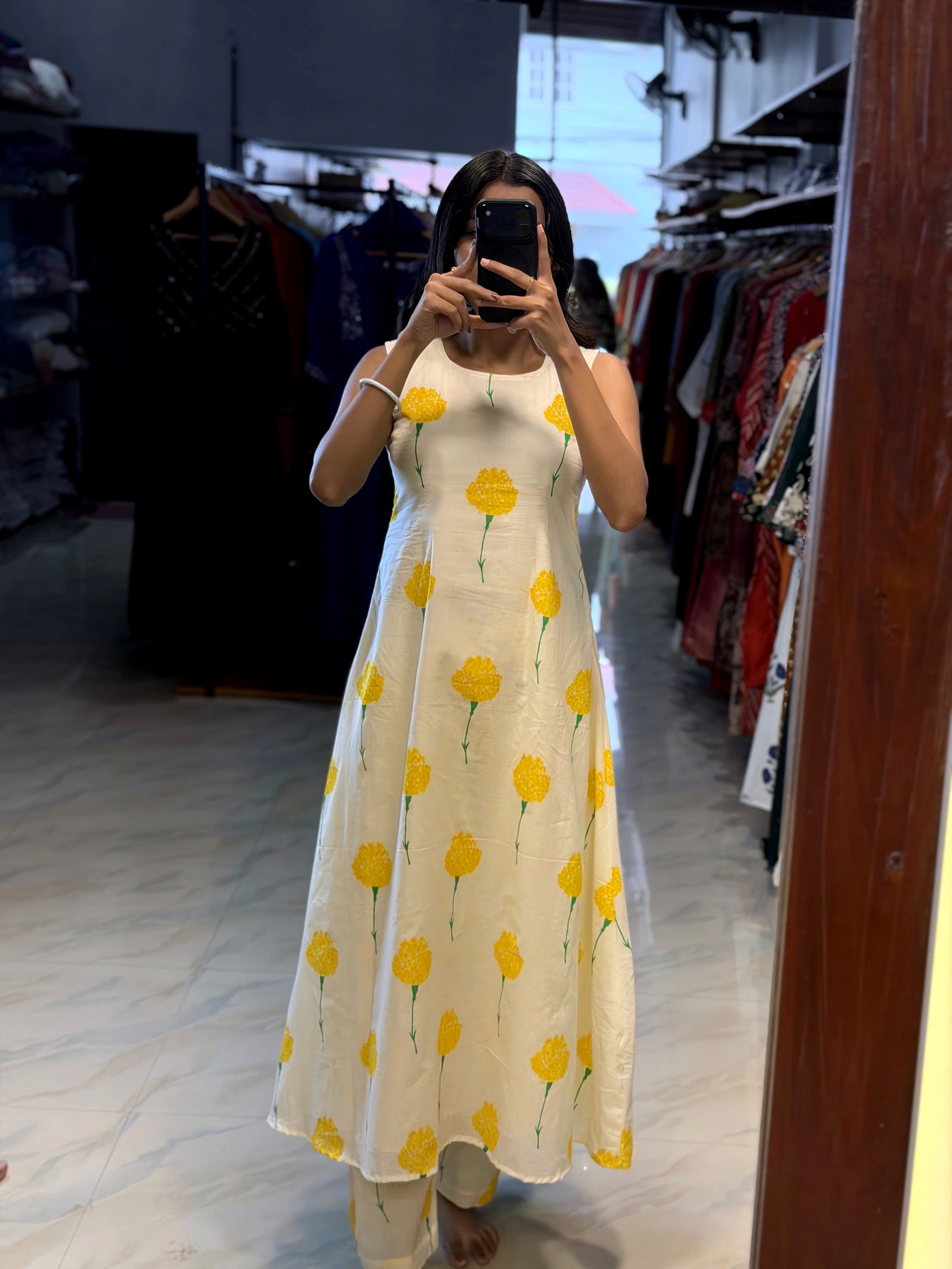 [PBC1002] Ivory Marigold Jaipur Hand-Block Cotton A-Line Kurti – full-length mirror view showing silhouette and matching bottoms