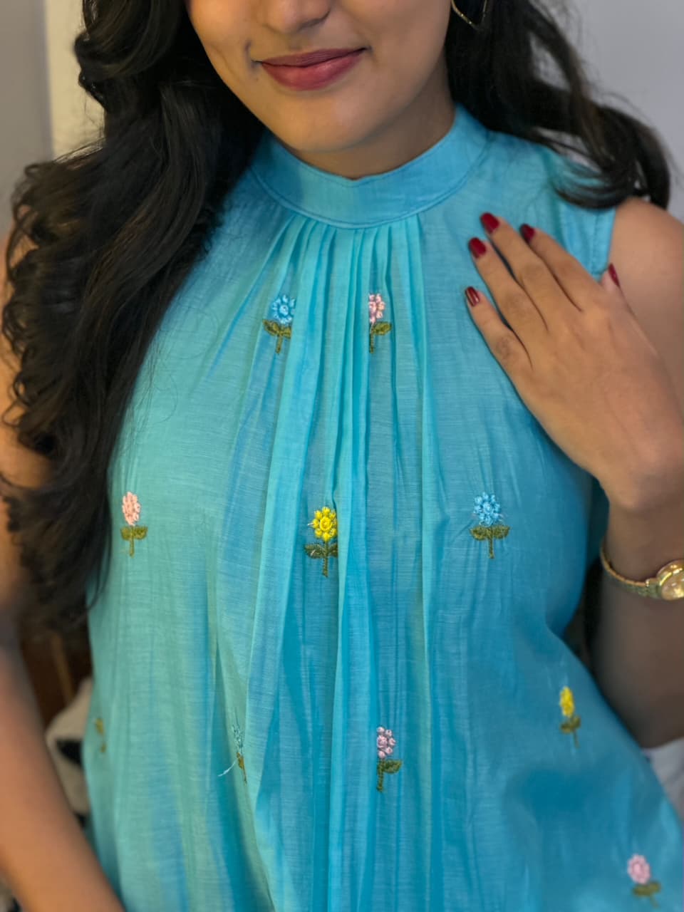 Close-up of gathered neckline and multicolor floral embroidery on [PBC1004] – sky blue Chanderi Silk