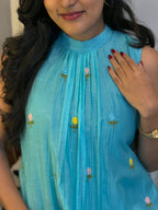 Close-up of gathered neckline and multicolor floral embroidery on [PBC1004] – sky blue Chanderi Silk