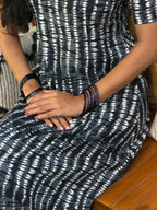 Fabric detail of [PBC1005] Midnight Shibori – white abstract resist-print pattern on black Jaipur Soft Cotton