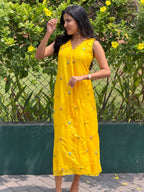 [PBC1010] Sunshine Yellow Embroidered Handloom Chanderi Silk Frill Dress – full-length front view, outdoor garden