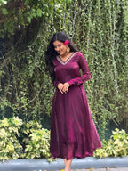 [PBC1013] Deep Magenta Luxury Monogram Twill Umbrella-Cut Anarkali – full-length angled view showing fabric drape