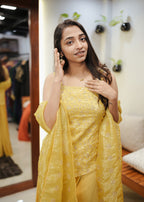 [PBC1014] Sunburst Yellow Sequin Embroidered Monogram Fabric – half-body portrait showing embroidery and dupatta