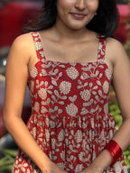 [PBC1029] Terracotta Floral Block Print – upper body close-up showing cream lotus block print on terracotta cotton