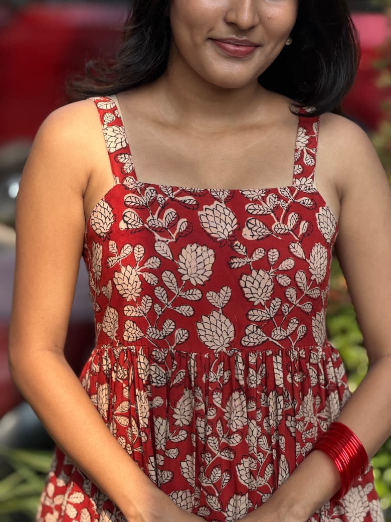 [PBC1029] Terracotta Floral Block Print – upper body close-up showing cream lotus block print on terracotta cotton