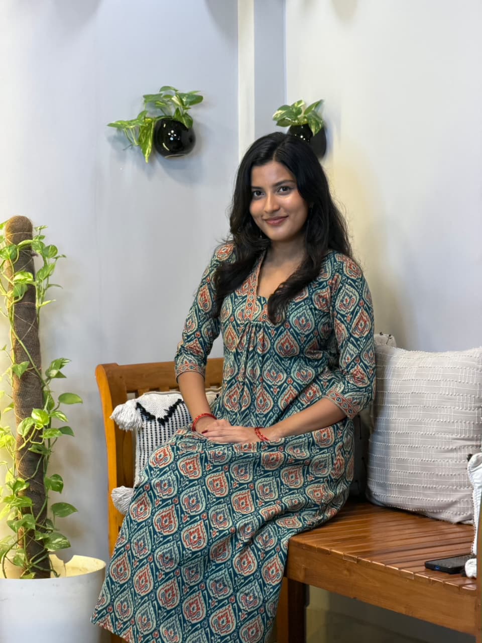 [PBC1031] Teal Medallion Print Jaipur Soft Cotton – seated view showing fabric drape and print detail
