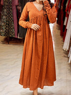 Detail of [PBC1032] – showing skirt flare and tiny floral booti block print on rust cotton