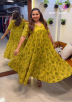 [PBC1035] Mustard Floral Block Print – full-length twirl view showing dress flare and olive green floral print