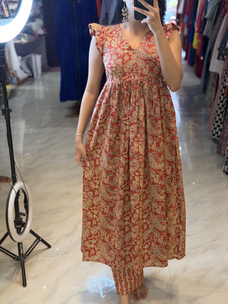 [PBC1036] Rust Paisley Hand-Block Jaipur Soft Cotton – full-length front view in store showing dress silhouette and bottoms