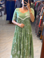 [PBC1038] Sage Green Floral Outline Mul Chanderi – full-length front view in store showing complete dress silhouette