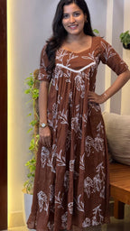 [PBC1039] Rust Brown Floral Outline Mul Chanderi – full-length front view showing the Frill A-Line silhouette and white floral outline print