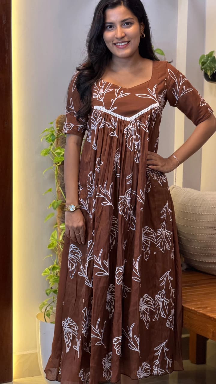 [PBC1039] Rust Brown Floral Outline Mul Chanderi – full-length front view showing the Frill A-Line silhouette and white floral outline print