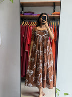 [PBC1039] Rust Brown Floral Outline Mul Chanderi – full-length in-store mirror view showing the complete silhouette