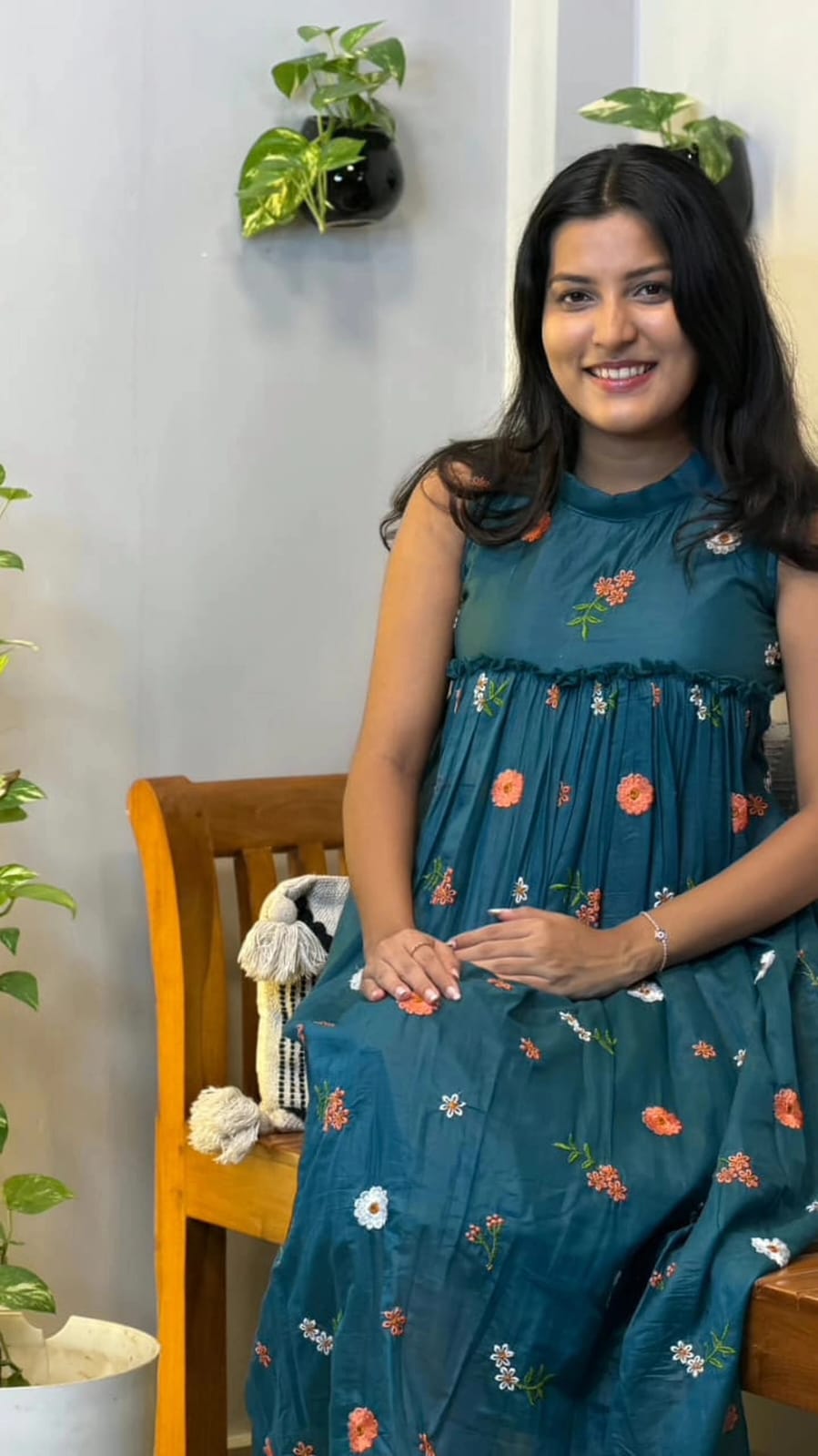 [PBC1043] Teal Floral Embroidered Mul Chanderi – seated showing the dress drape and embroidered florals