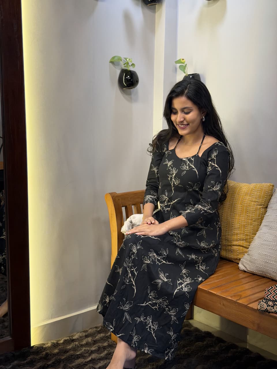 [PBC1049] Black Floral Outline Jaipur Soft Cotton – seated showing the dress drape and floral outline print