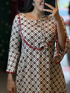 [PBC1052] Ivory & Red Geometric Ajrakh Jaipur Soft Cotton – in-store mirror close-up of the yoke and geometric print