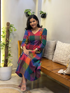 [PBC1085] Multicolour Madras check Jaipur Soft Cotton – seated full-length view showing the skirt drape